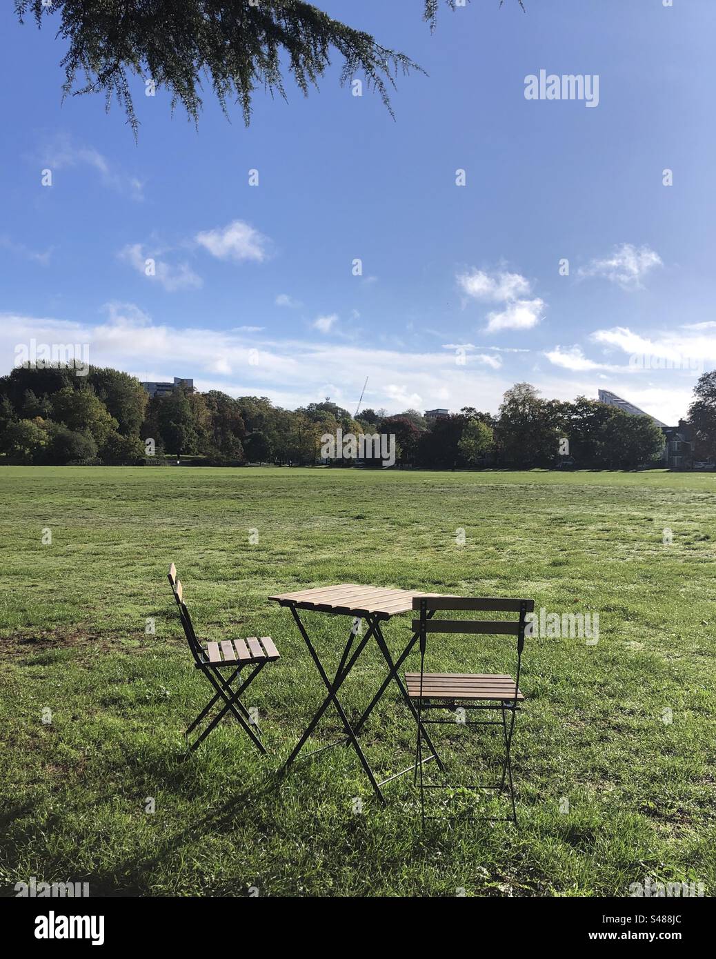 Coffee table and chairs in a park - Smartphone Captured Stock Image