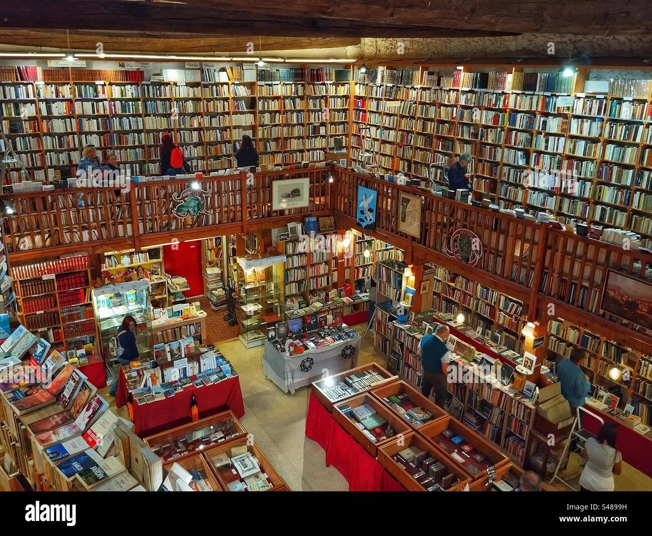 Old bookstore: Find everything books. More than 50,000 books in stock. Along the Canal du Midi. Le Somail, Occitanie, France - Smartphone Captured Stock Image
