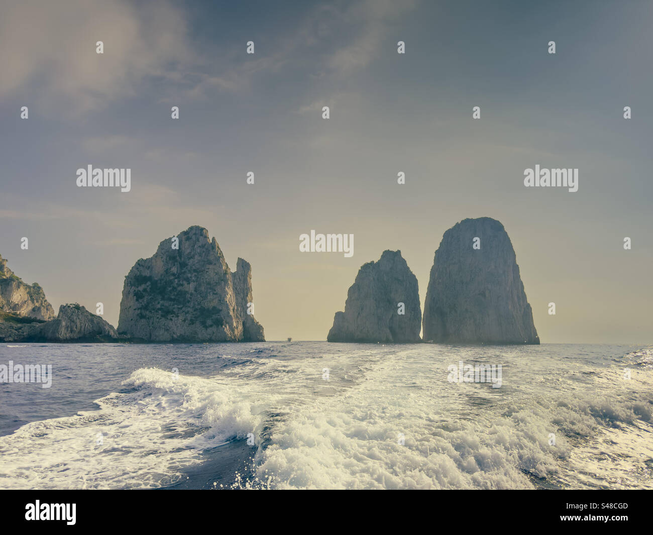 Faraglione di Mezzo Rock Formation Rising from the Tyrrhenian Sea, Island of Capri, Italy - Smartphone Captured Stock Image