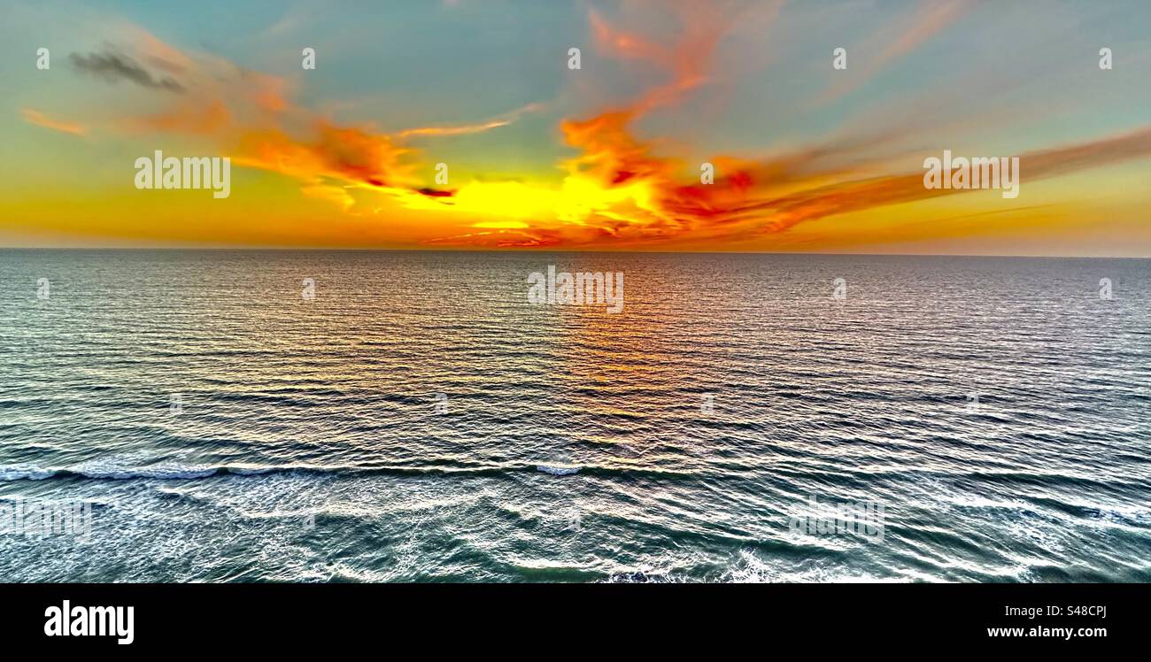 Sunset over the Pacific Ocean. Stock Photo