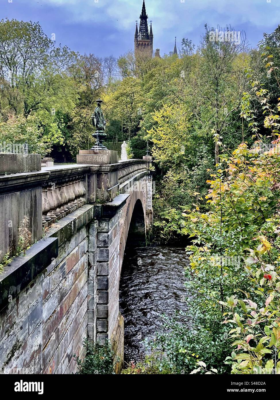 Bridge over River Kelvin, looking toward Glasgow University. Scotland Stock Photo