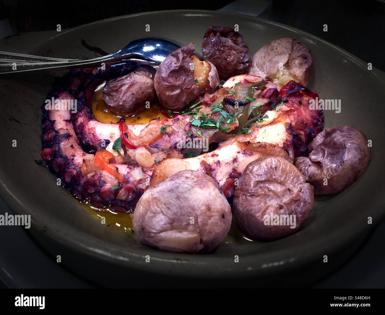 Sautéed octopus with potatoes - Smartphone Captured Stock Image