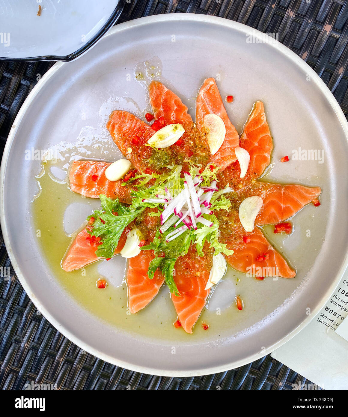 Salmon sashimi plate at a Japanese restaurant - Smartphone Captured Stock Image