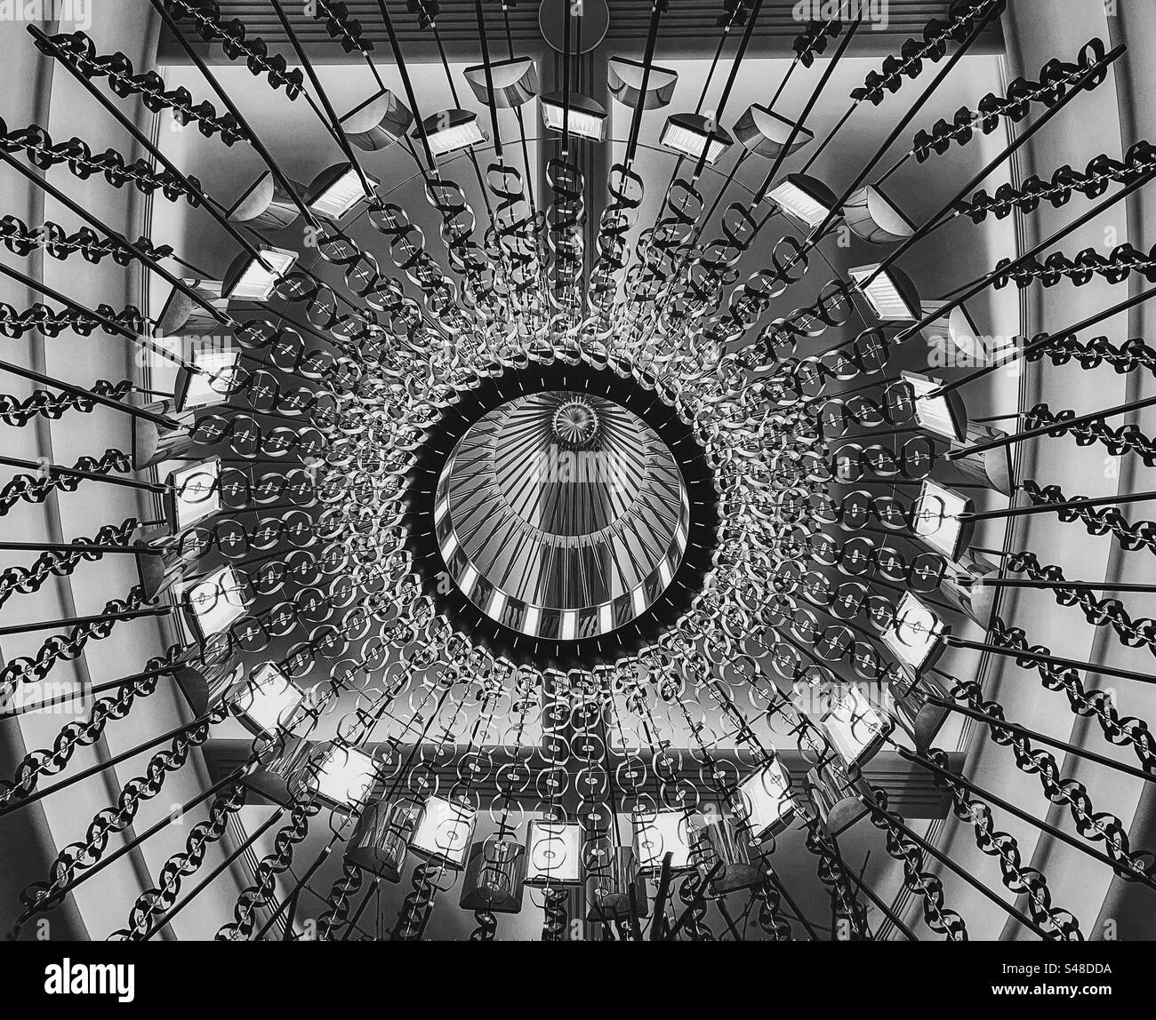 Low angle view of chandelier light. Abstract. Pattern. Lines. Backgrounds. - Smartphone Captured Stock Image