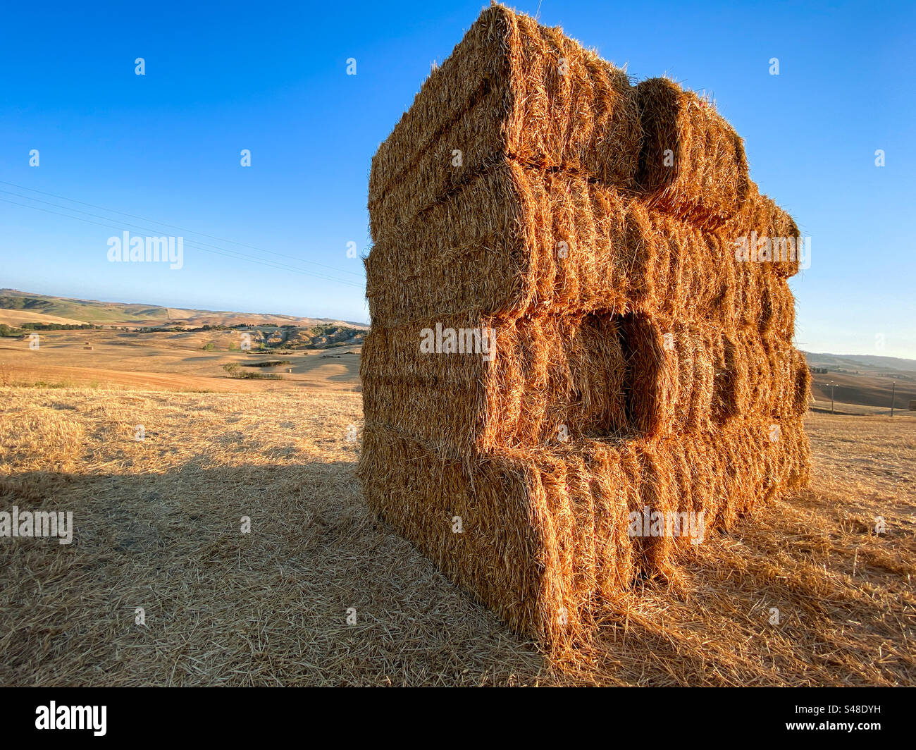 Bales of hay at harvest time in the Tuscan countryside - Smartphone Captured Stock Image