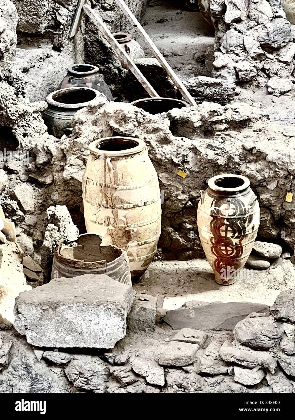 Painted urns in the ruins of Akrotiri - Smartphone Captured Stock Image