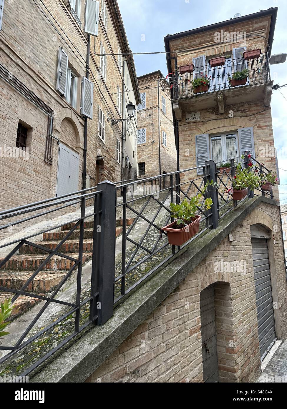 Street view in the old town of Petritoli, Fermo province, Marche region, Italy - Smartphone Captured Stock Image