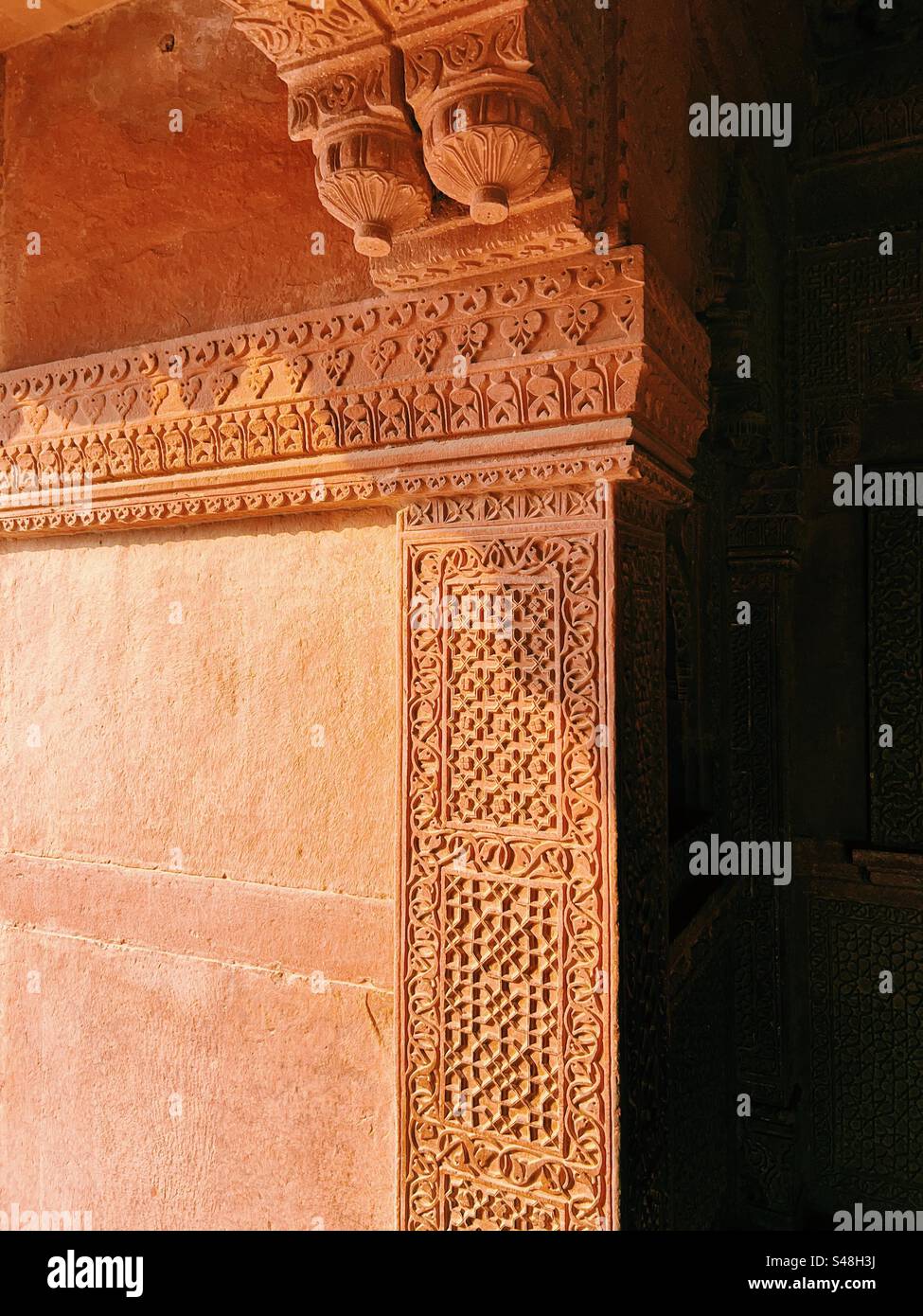 Architecture, designs of Mughal palace showing patterns and details of UNESCO World Heritage Site at Fatehpur Sikri in India - Smartphone Captured Stock Image