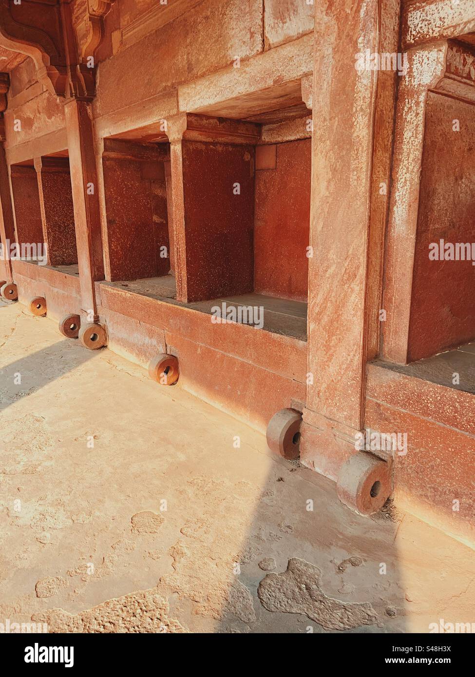 Architecture, designs of Mughal palace showing patterns and details of UNESCO World Heritage Site at Fatehpur Sikri in India - Smartphone Captured Stock Image