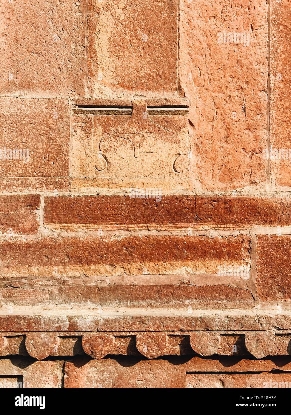 Architecture, designs of Mughal palace showing patterns and details of UNESCO World Heritage Site at Fatehpur Sikri in India - Smartphone Captured Stock Image
