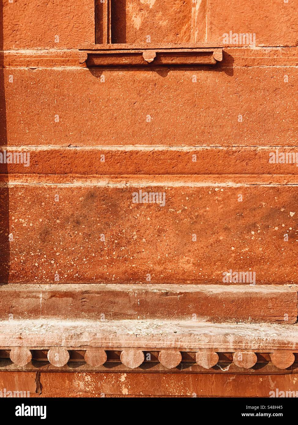 Architecture, designs of Mughal palace showing patterns and details of UNESCO World Heritage Site at Fatehpur Sikri in India - Smartphone Captured Stock Image