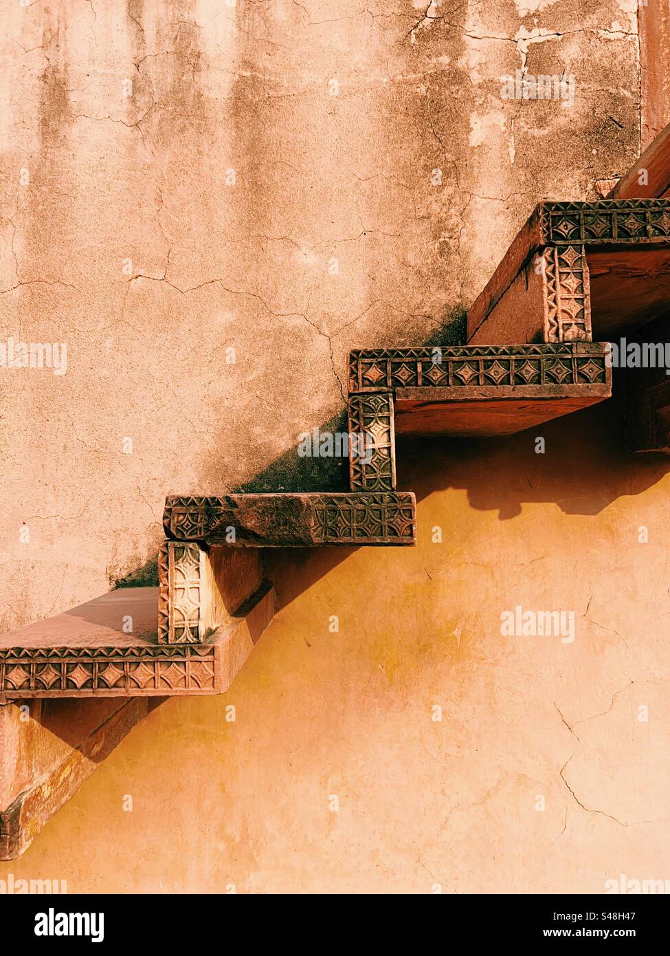 Architecture, designs of Mughal palace showing patterns and details of UNESCO World Heritage Site at Fatehpur Sikri in India - Smartphone Captured Stock Image