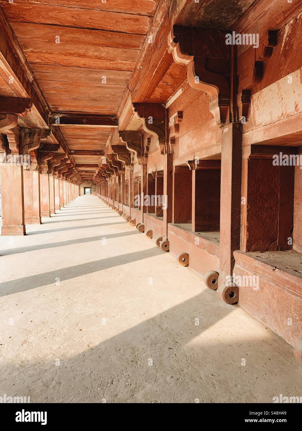 Architecture, designs of Mughal palace showing patterns and details of UNESCO World Heritage Site at Fatehpur Sikri in India - Smartphone Captured Stock Image