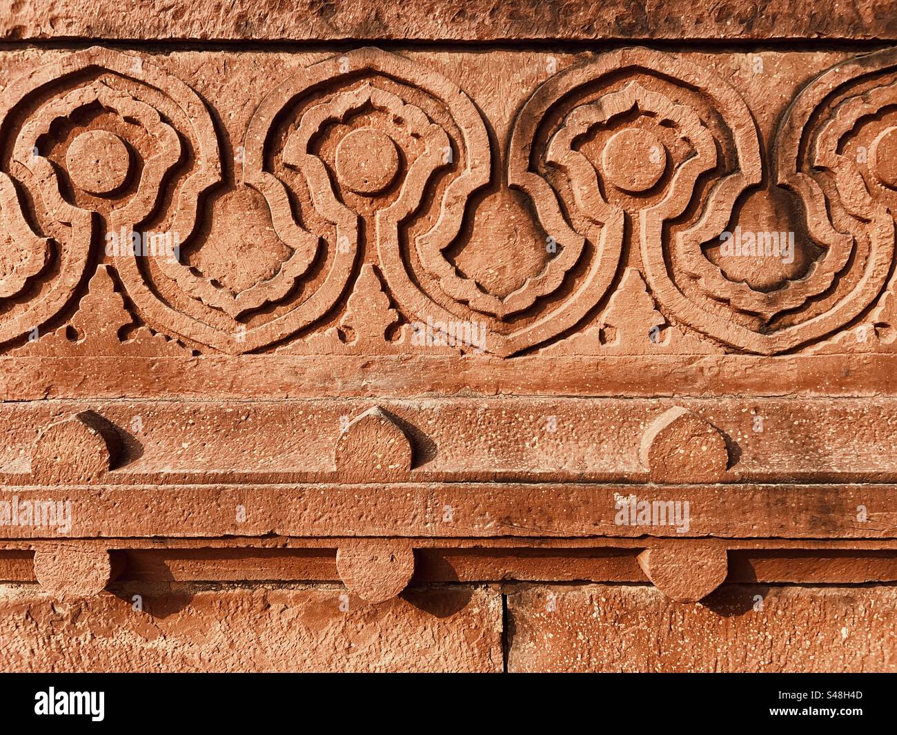 Architecture, designs of Mughal palace showing patterns and details of UNESCO World Heritage Site at Fatehpur Sikri in India - Smartphone Captured Stock Image