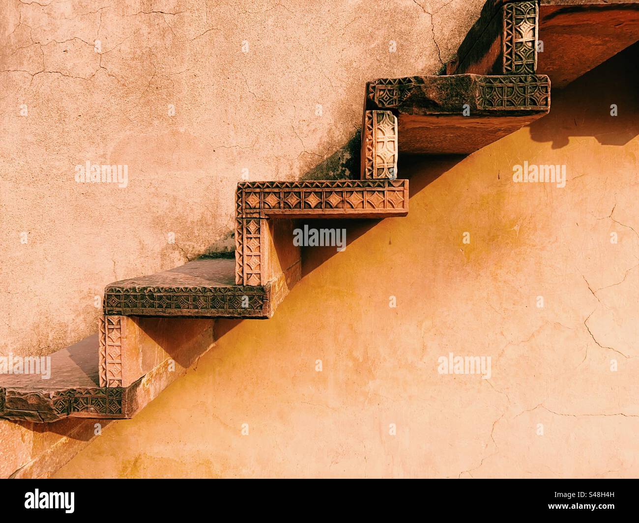 Architecture, designs of Mughal palace showing patterns and details of UNESCO World Heritage Site at Fatehpur Sikri in India - Smartphone Captured Stock Image