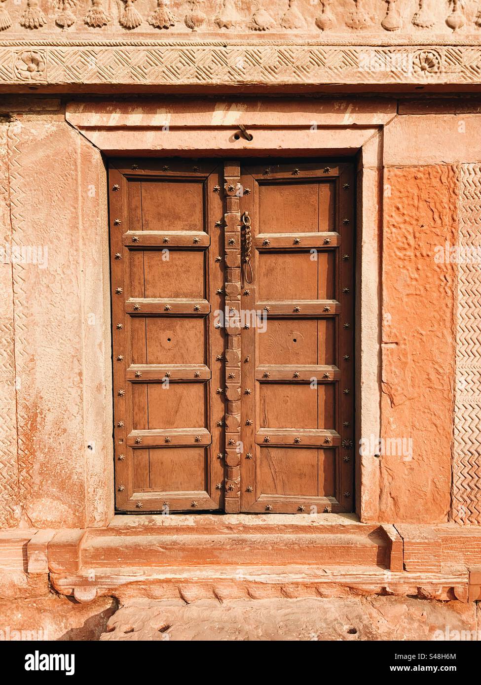 Emperor Akbar’s palace door, a UNESCO World Heritage Site in Fatehpur, India - Smartphone Captured Stock Image
