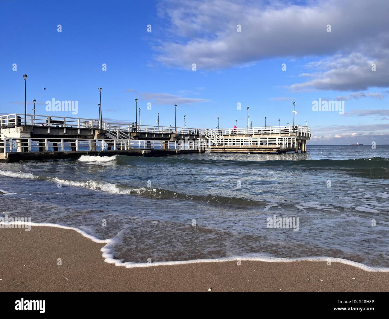 Brzezno pier and beach at the Gdansk Bay on the Baltic Sea, Gdansk, Poland - Smartphone Captured Stock Image