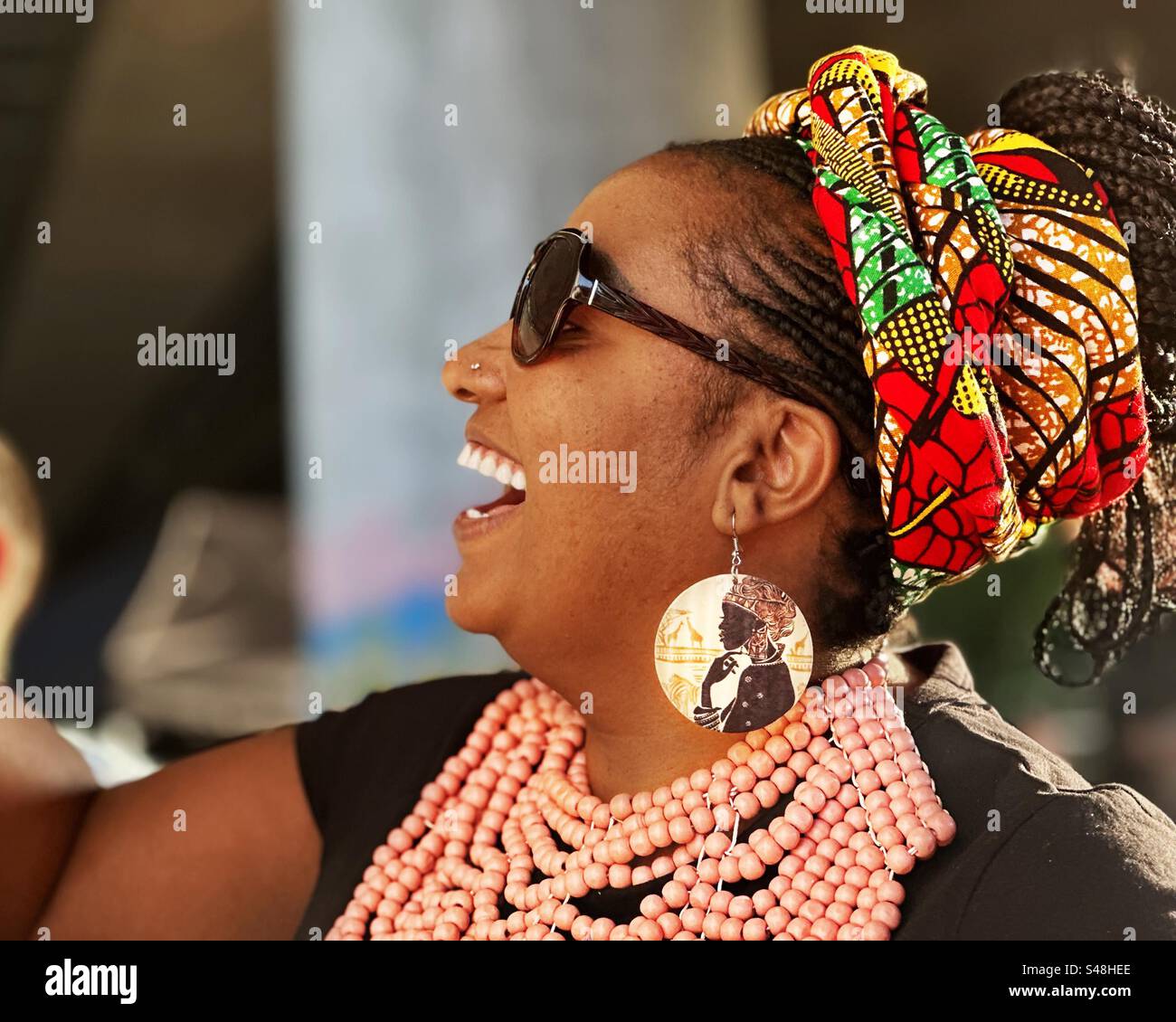 Beautiful smiling African American woman - Smartphone Captured Stock Image