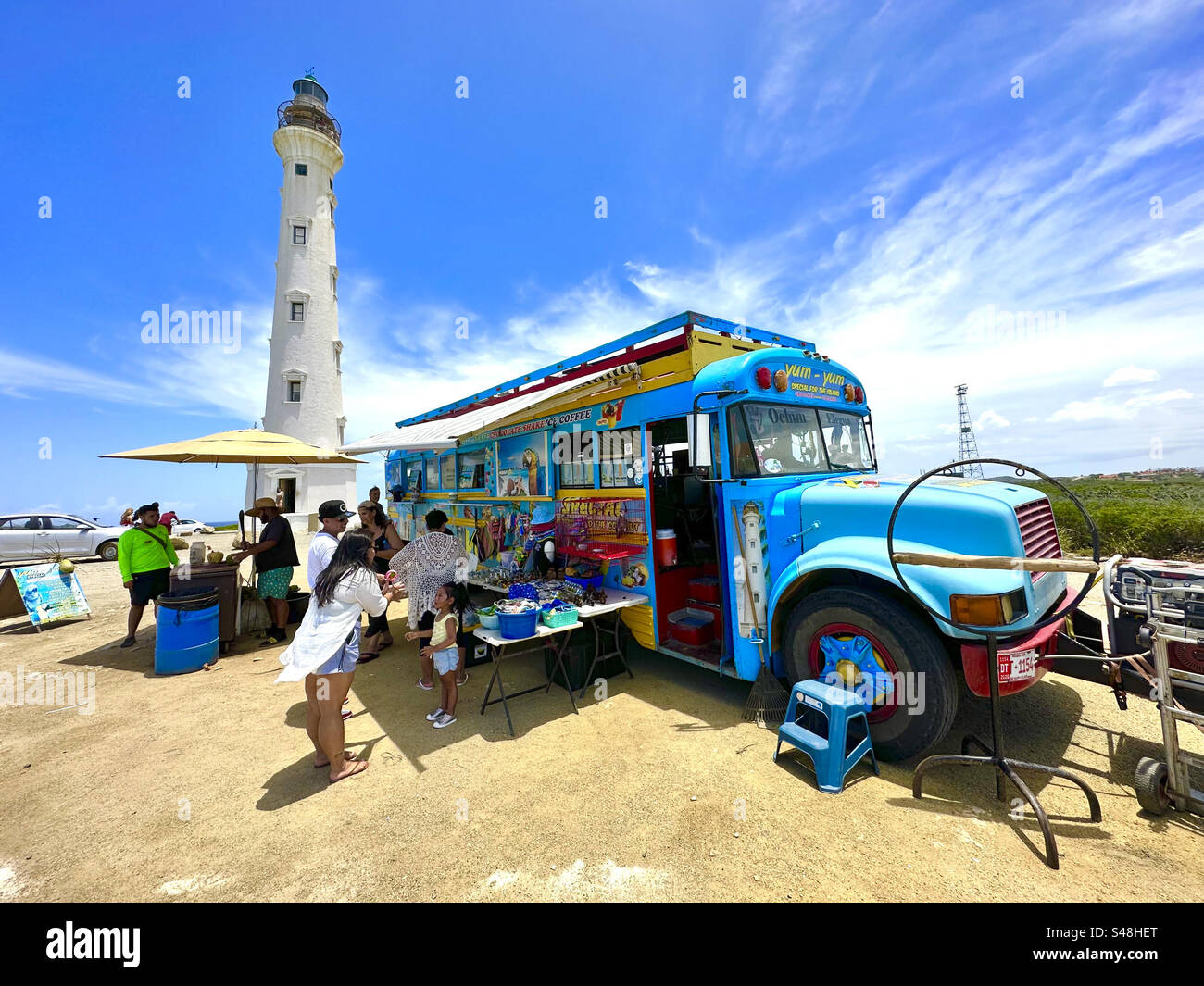California Lighthouse and refreshment van. Western Tip, Aruba, Dutch Antilles. Caribbean - Smartphone Captured Stock Image