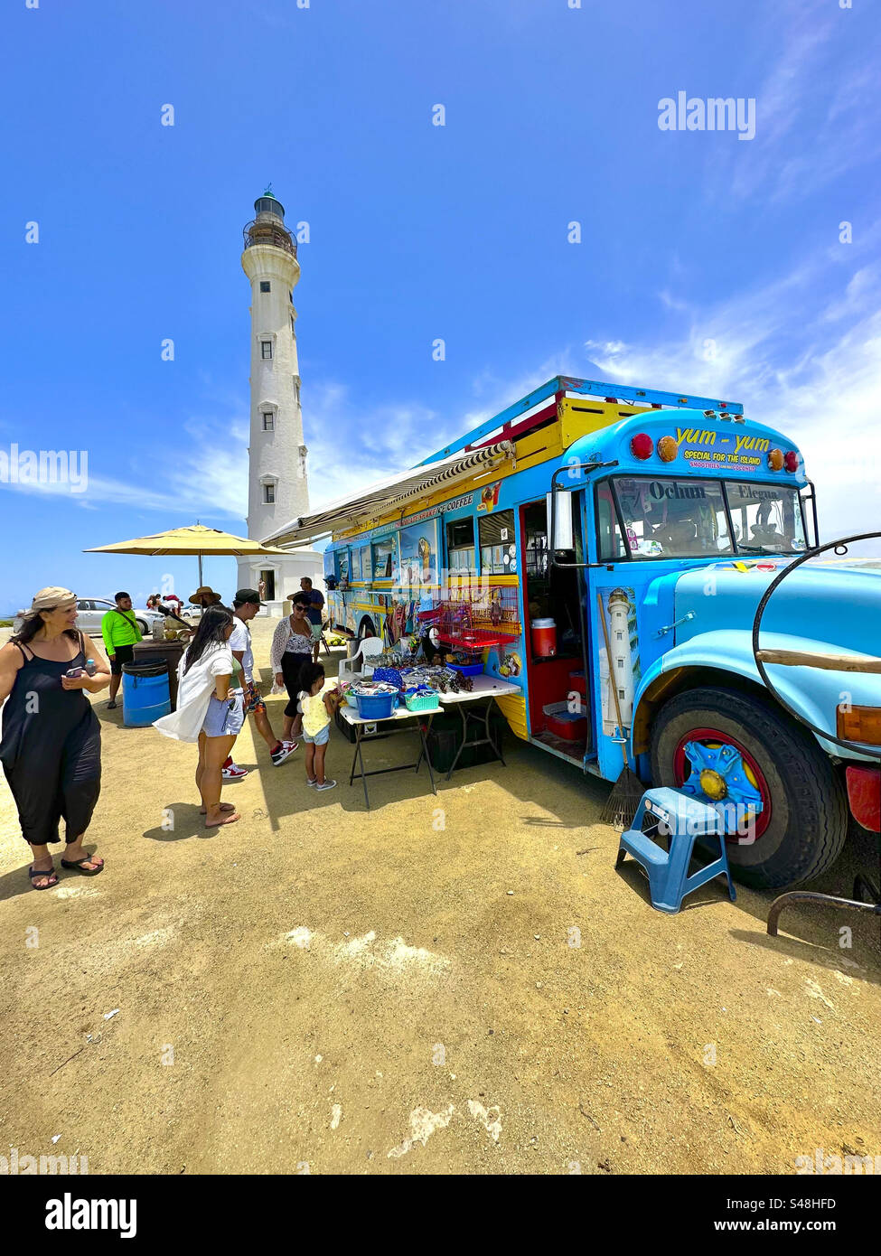 California Lighthouse and refreshment truck. Western Tip, Aruba, Dutch Antilles. Caribbean - Smartphone Captured Stock Image