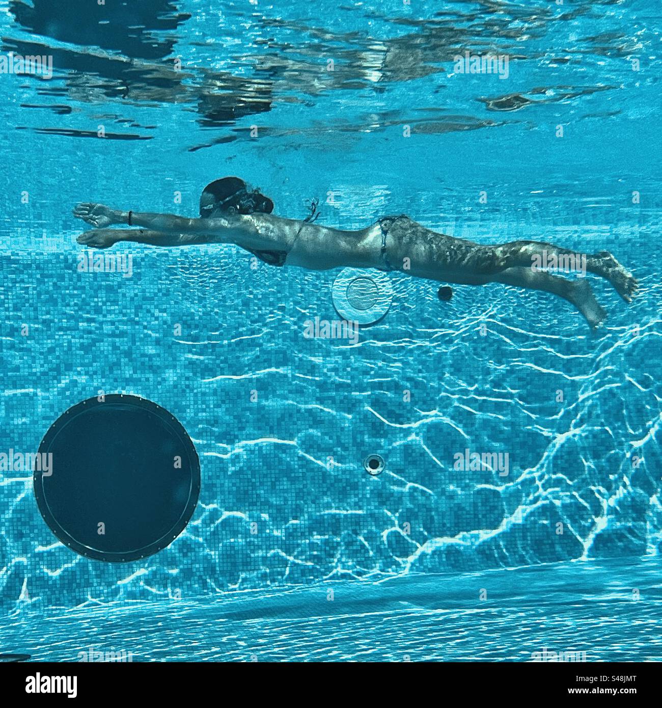 Female swimmer underwater gliding Stock Photo Alamy