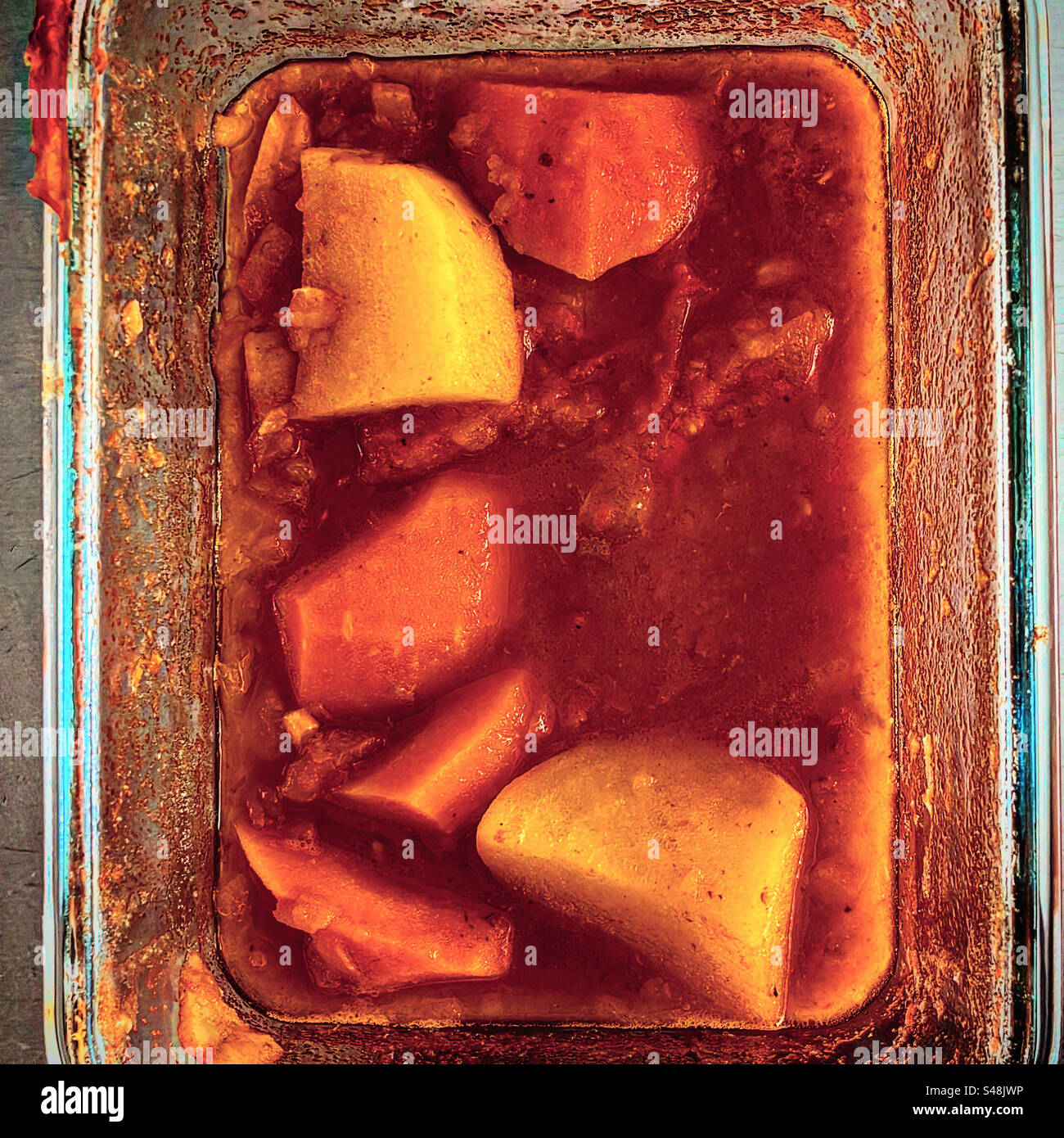 top view of a carot potato curry recipe dish looking delicious just cooked in a kitchen for lunck diner dinner to eat eating - Smartphone Captured Stock Image