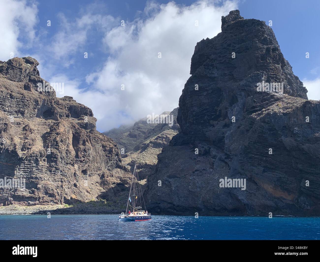 Los Gigantes cliffs Tenerife and small boat Stock Photo