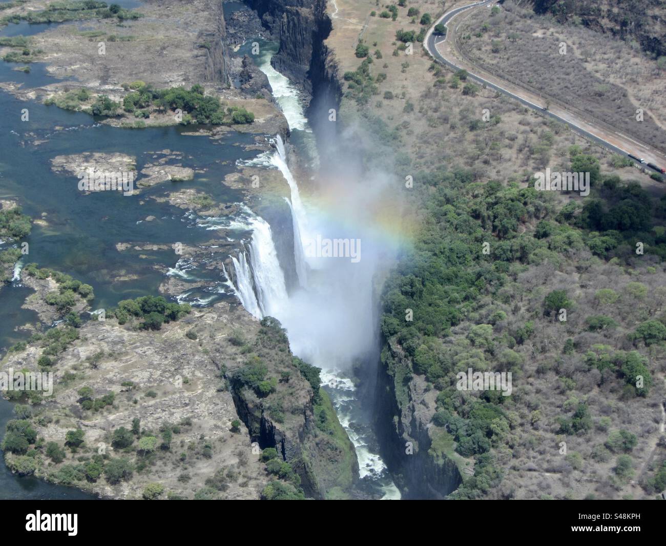 Rainbow over Victoria Falls on the Zambezi River in Africa - Smartphone Captured Stock Image