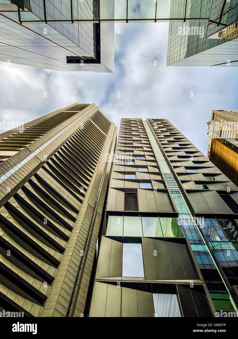 Low angle view of skyscrapers in the city centre in Melbourne, Australia. - Smartphone Captured Stock Image Low angle view of skyscrapers in the city centre in Melbourne, Australia. - Smartphone Captured Stock Image