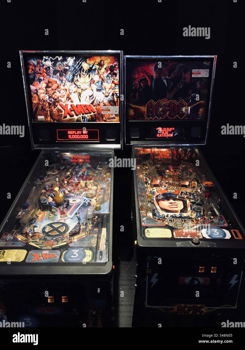 Shot of two pinball machines side by side  in anarcade - Smartphone Captured Stock Image