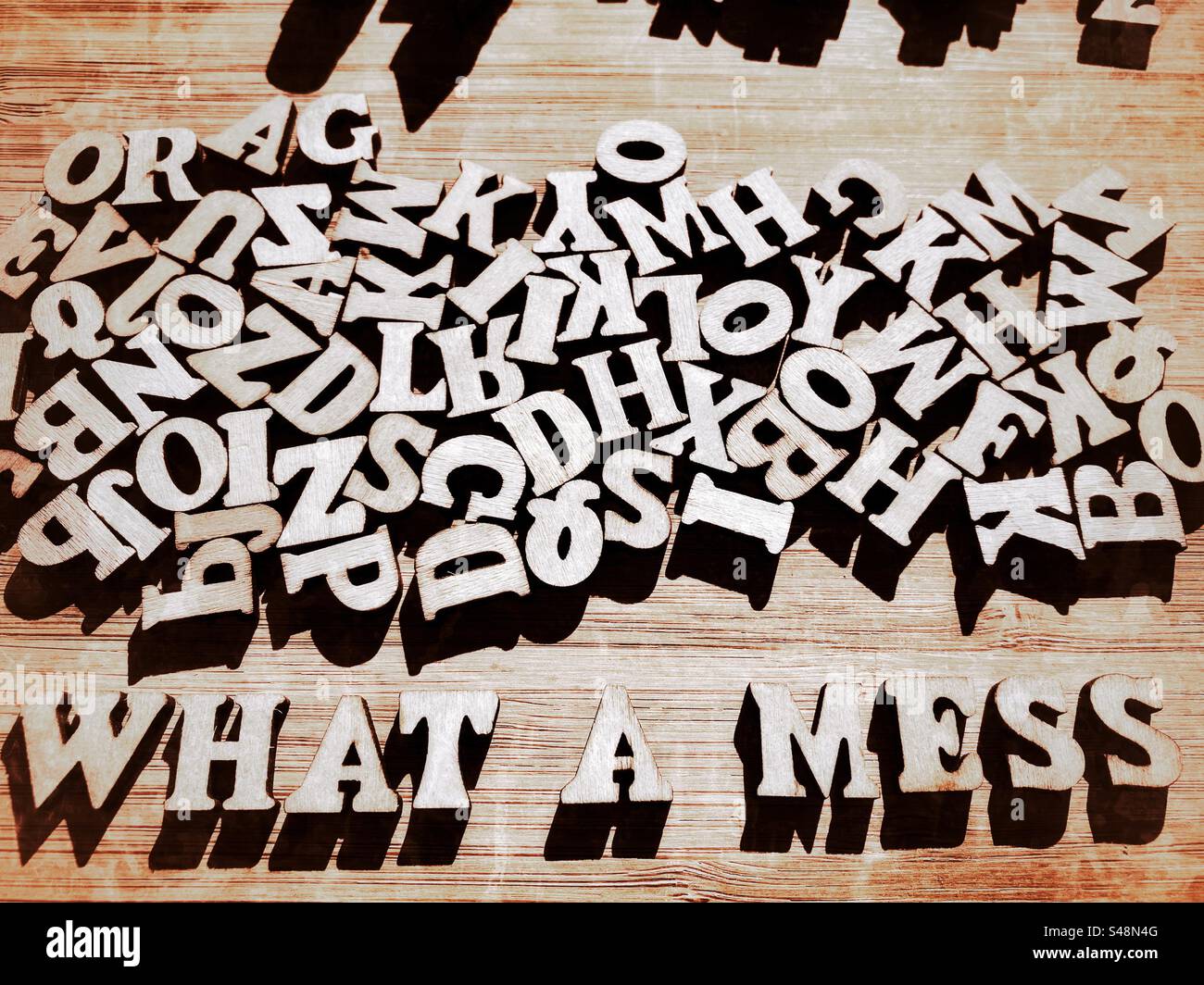 What A Mess, words in wooden alphabet letters isolated on background Stock Photo