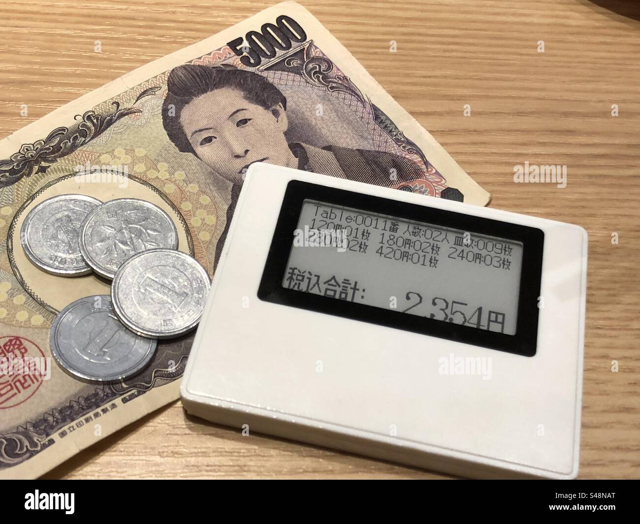 Food pager and Yen in Japan Stock Photo