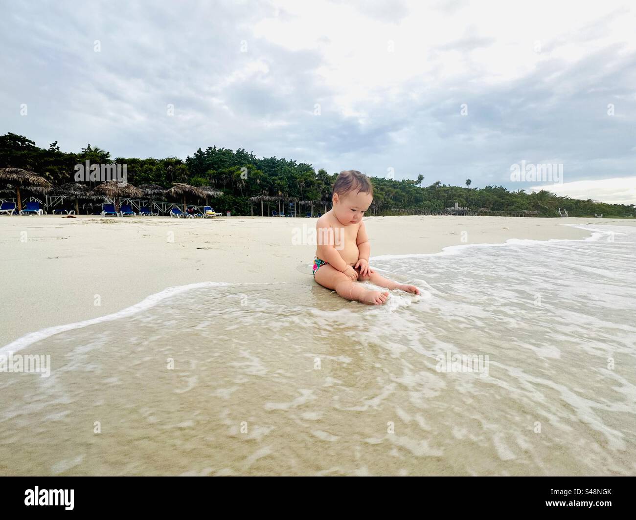 Beach trip with baby. Varadero, Cuba - Smartphone Captured Stock Image