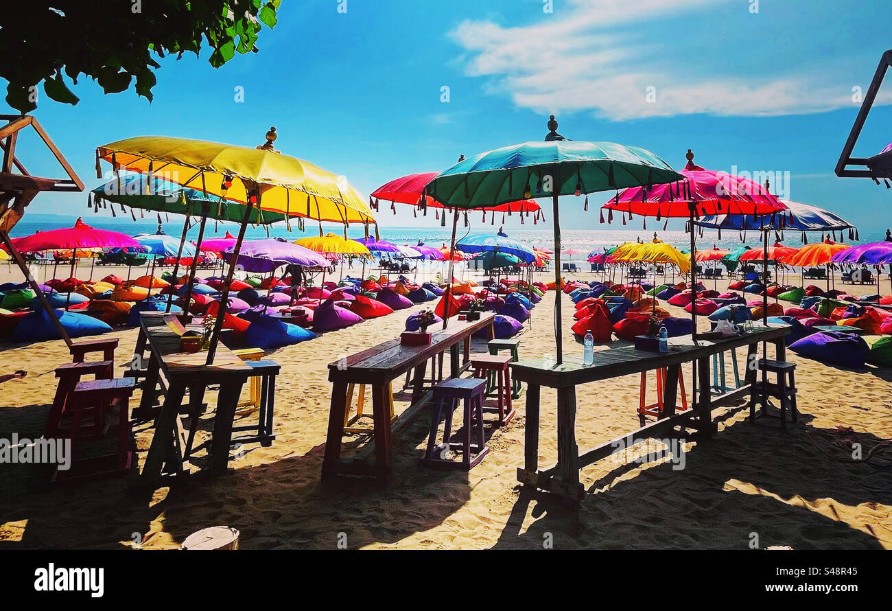 Bean bags and umbrellas ready for sunset drinks in Seminyak bali - Smartphone Captured Stock Image