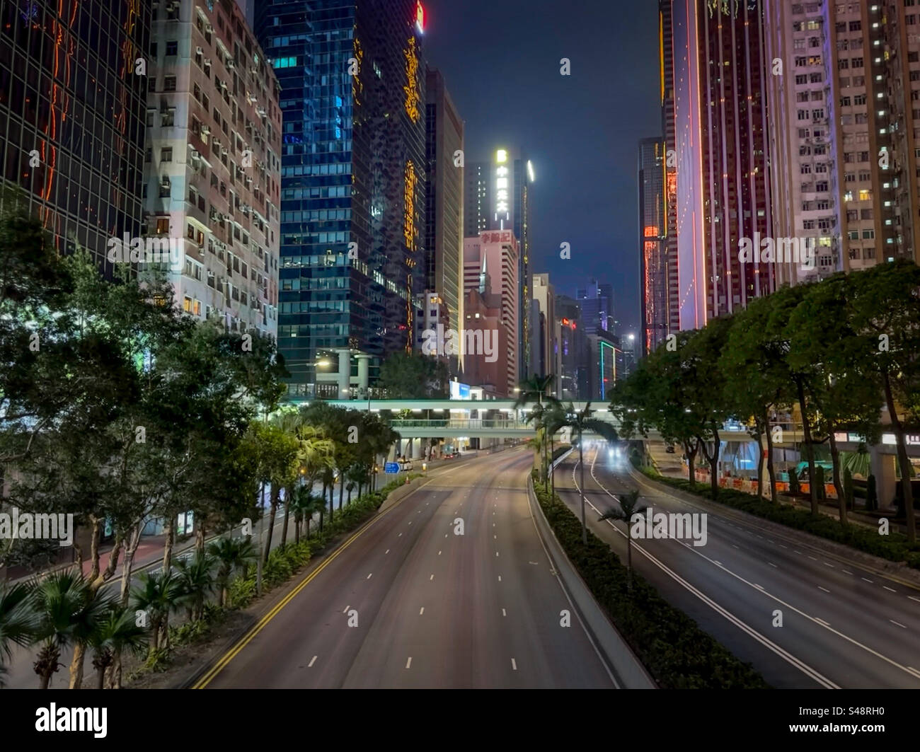 Wan chai district in Hong Kong at night from Gloucester street Stock Photo