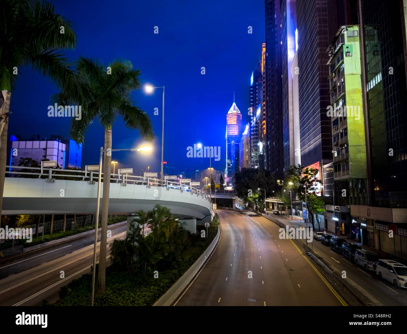 Wan chai district in Hong Kong at night from Gloucester street - Smartphone Captured Stock Image