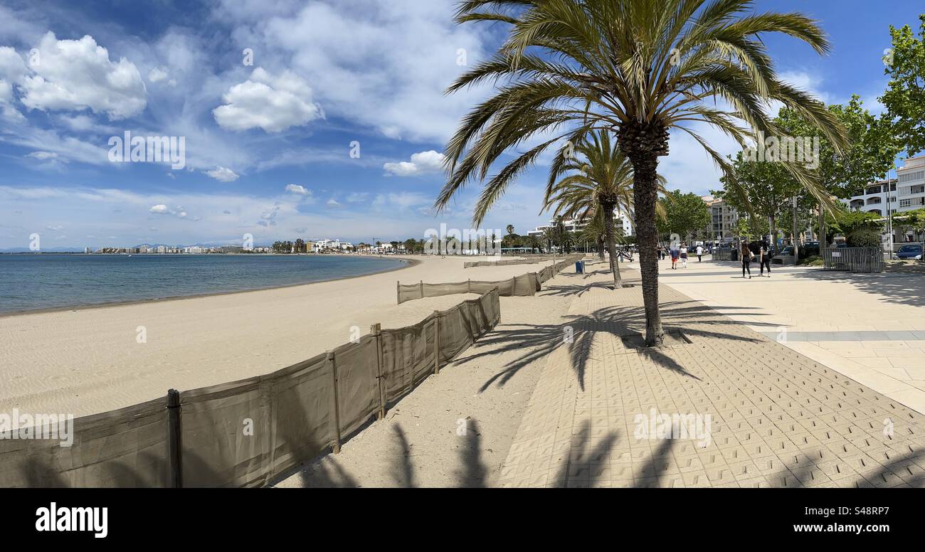 Wide panorama shot of the main beach and waterfront path in Roses, Costa Brava, Spain - Smartphone Captured Stock Image