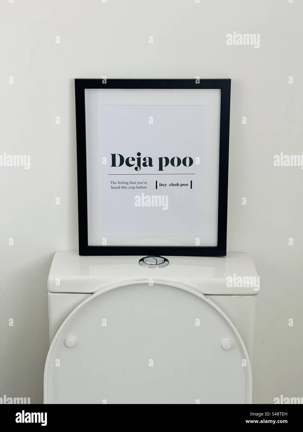 Toilet humour on toilet Stock Photo