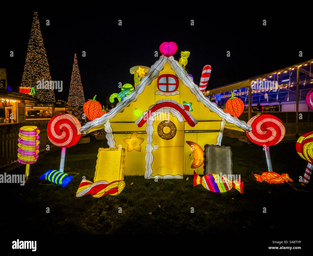 Christmas illuminations at Cardiff Castle 2024 with Santa, Rudolph, and snowmen, festive lifestyle scene: Phillip Roberts - Smartphone Captured Stock Image