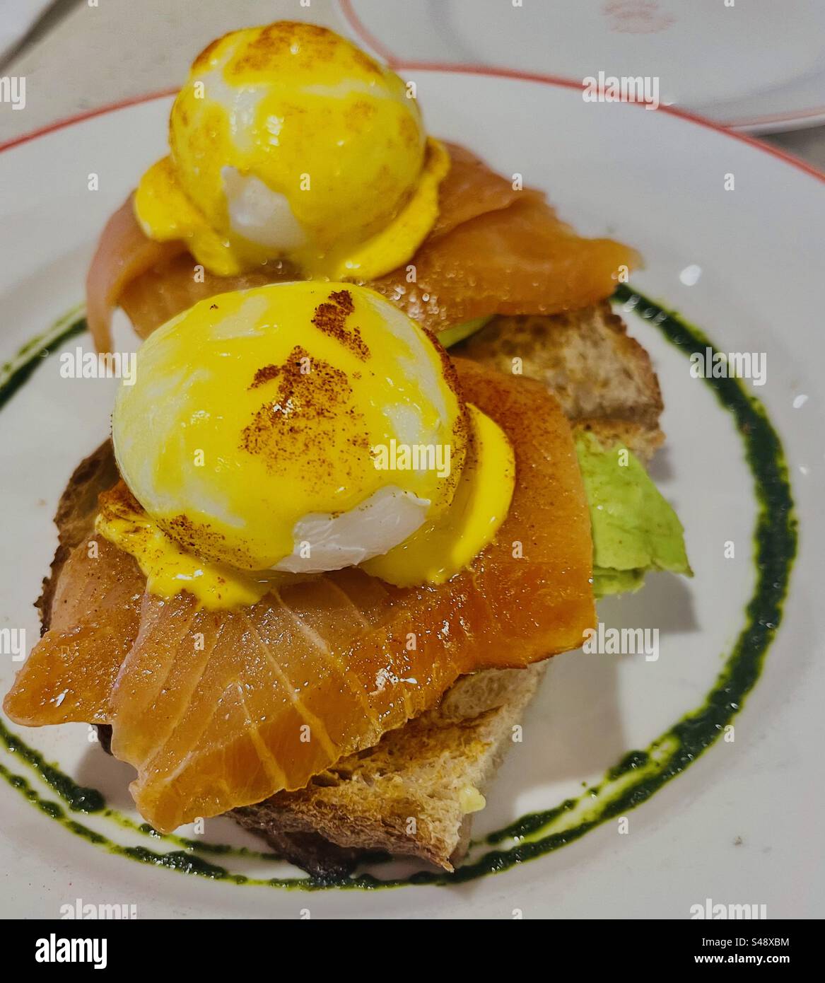 Salmon Egg Benedict. Stock Photo