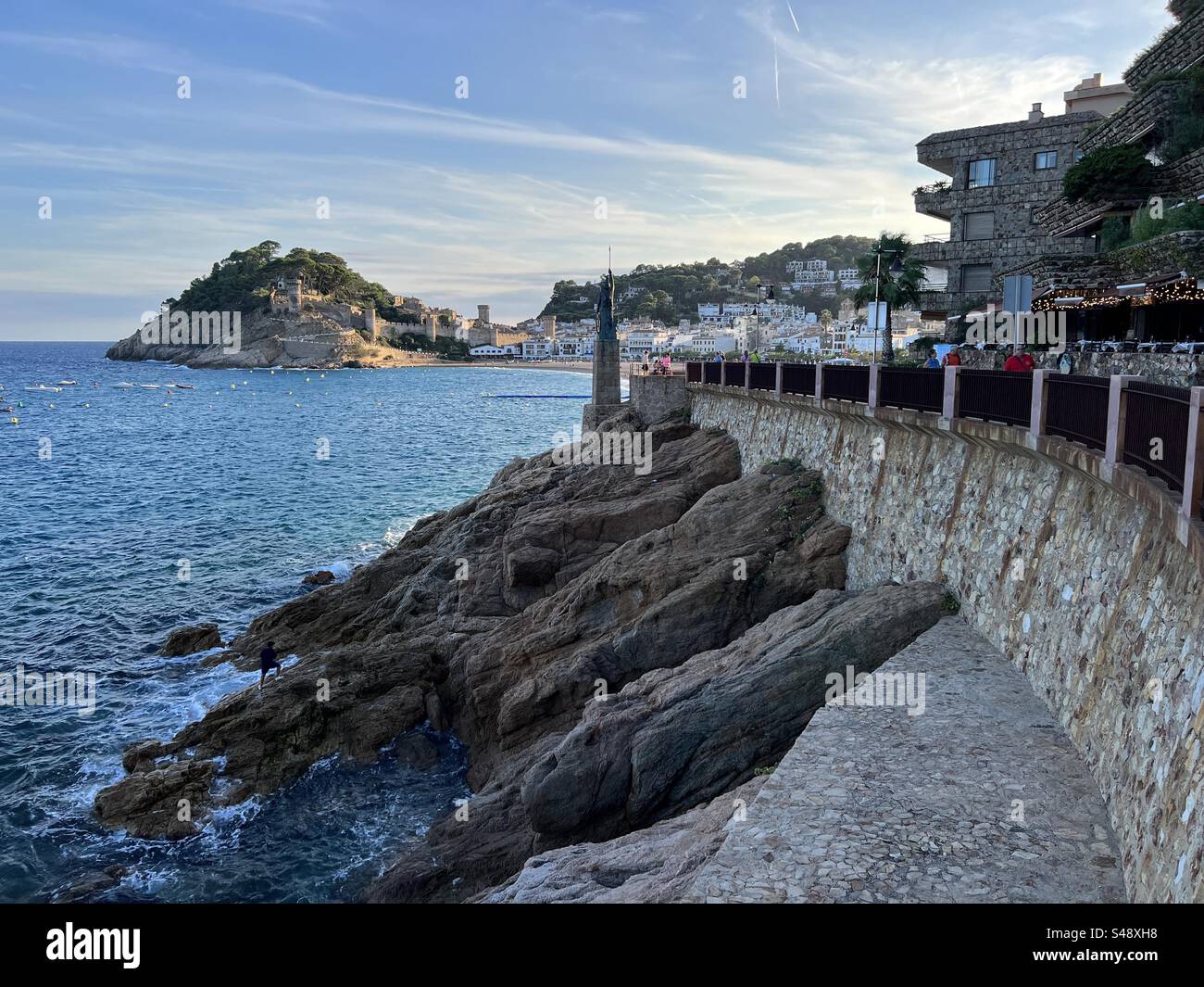 Coastal road, waterfront cliffs and castle in Tossa de Mar, Costa Brava, Spain - Smartphone Captured Stock Image