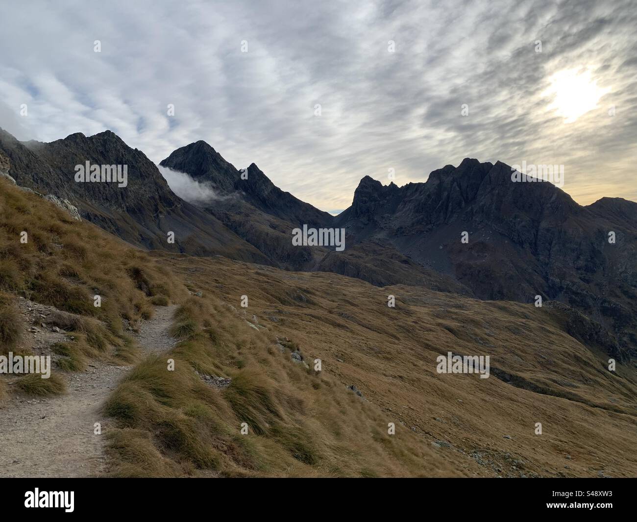 Scendendo dal passo della Selletta in un giorno d’autunno. Carona, Italia. - Smartphone Captured Stock Image