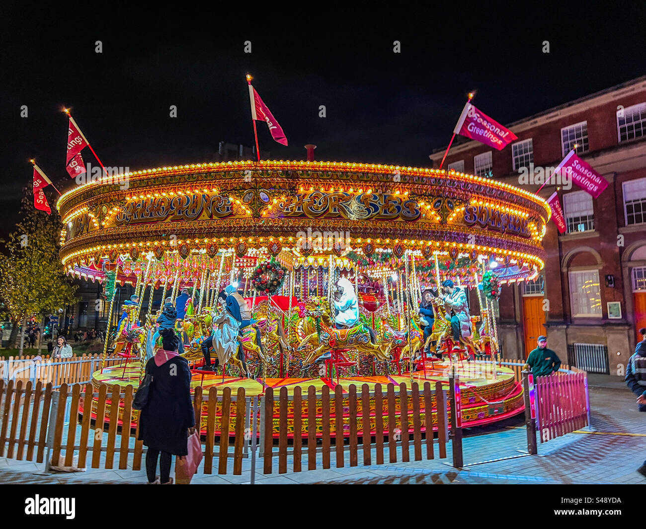 Merry go round at Leeds Christmas market Stock Photo