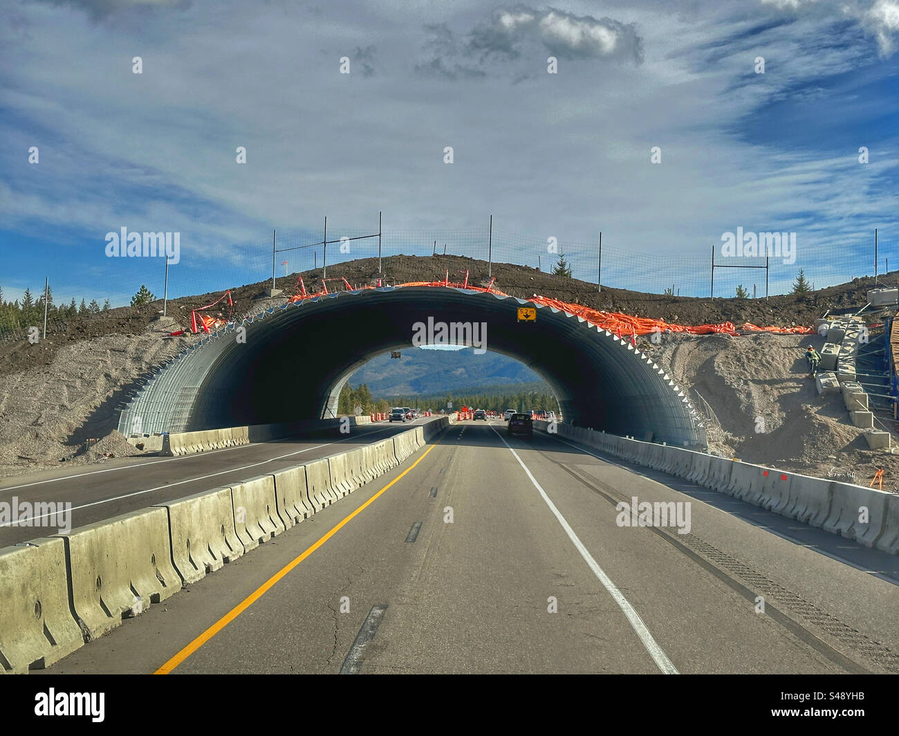 A wildlife overpass being constructed near Lac Des Arcs outside the eastern edge of Banff National Park, Canada, in 2023. - Smartphone Captured Stock Image