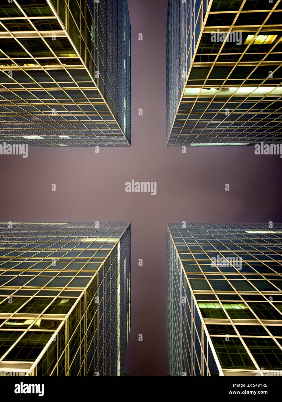 Upward view of office buildings at night - Smartphone Captured Stock Image