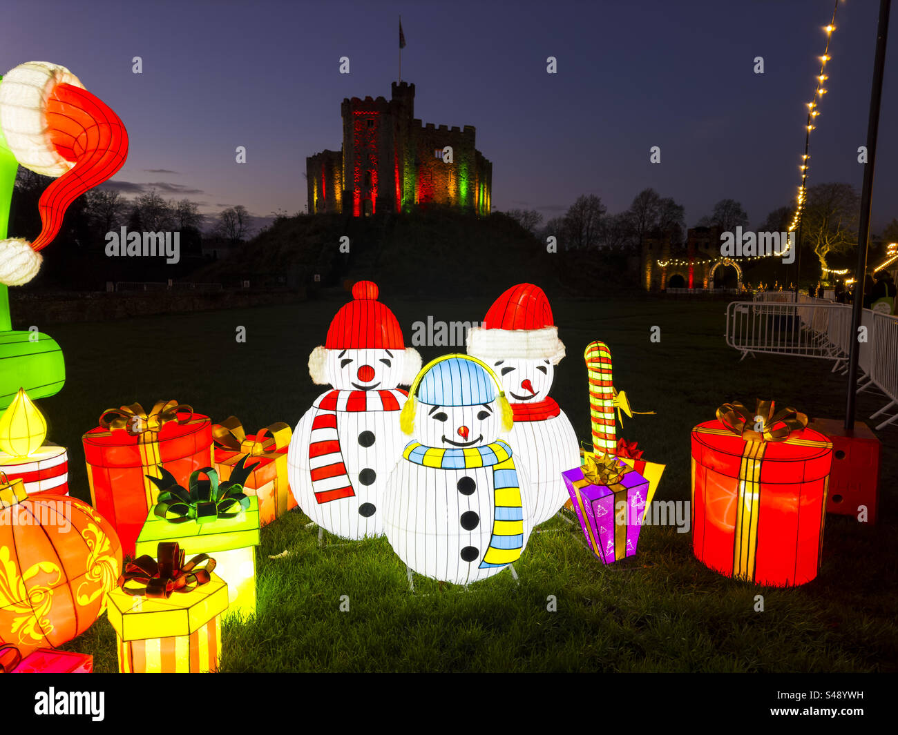 Christmas illuminations at Cardiff Castle 2024 with Santa, Rudolph, and snowmen, festive lifestyle scene: Phillip Roberts - Smartphone Captured Stock Image
