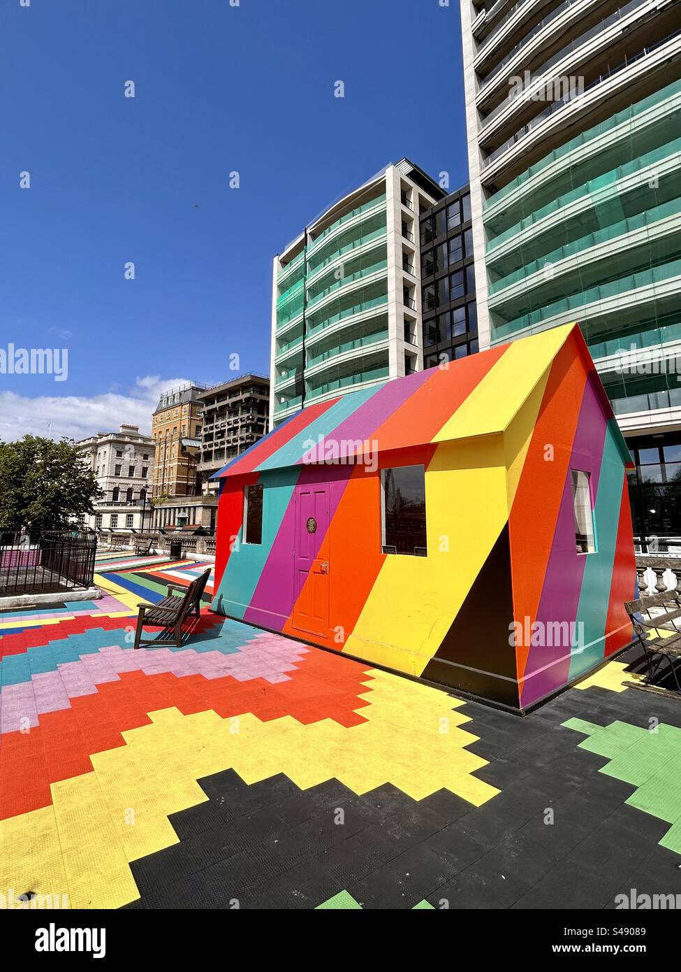 Brightly coloured artists garden above Temple underground station on ...