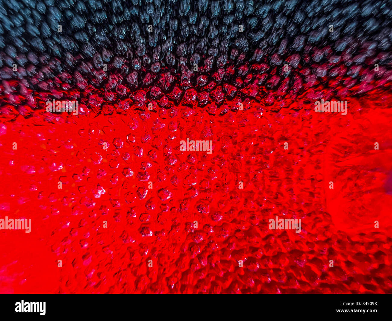 Ice crystals on red and black - Smartphone Captured Stock Image