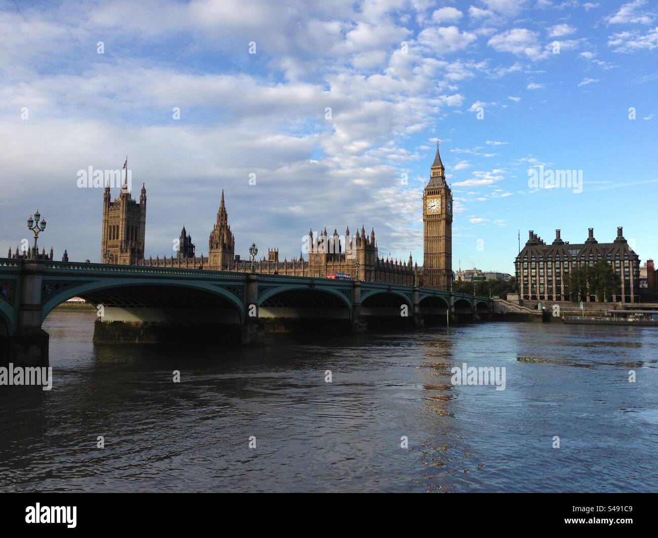 A weather front moves across The Houses of Parliament in London - Smartphone Captured Stock Image