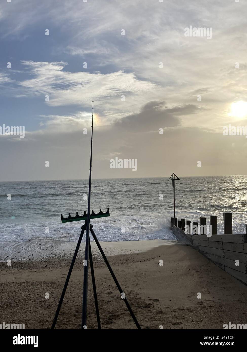 Sea fishing on the beach at sunset - Smartphone Captured Stock Image